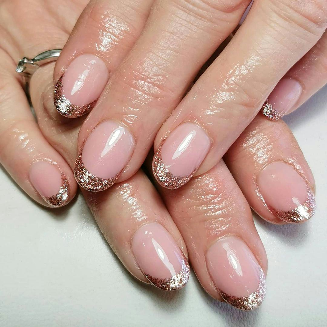 Try rose gold French tip nails.