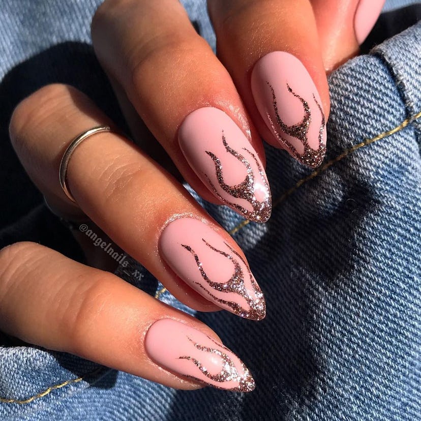 Try nails with rose gold flame designs.
