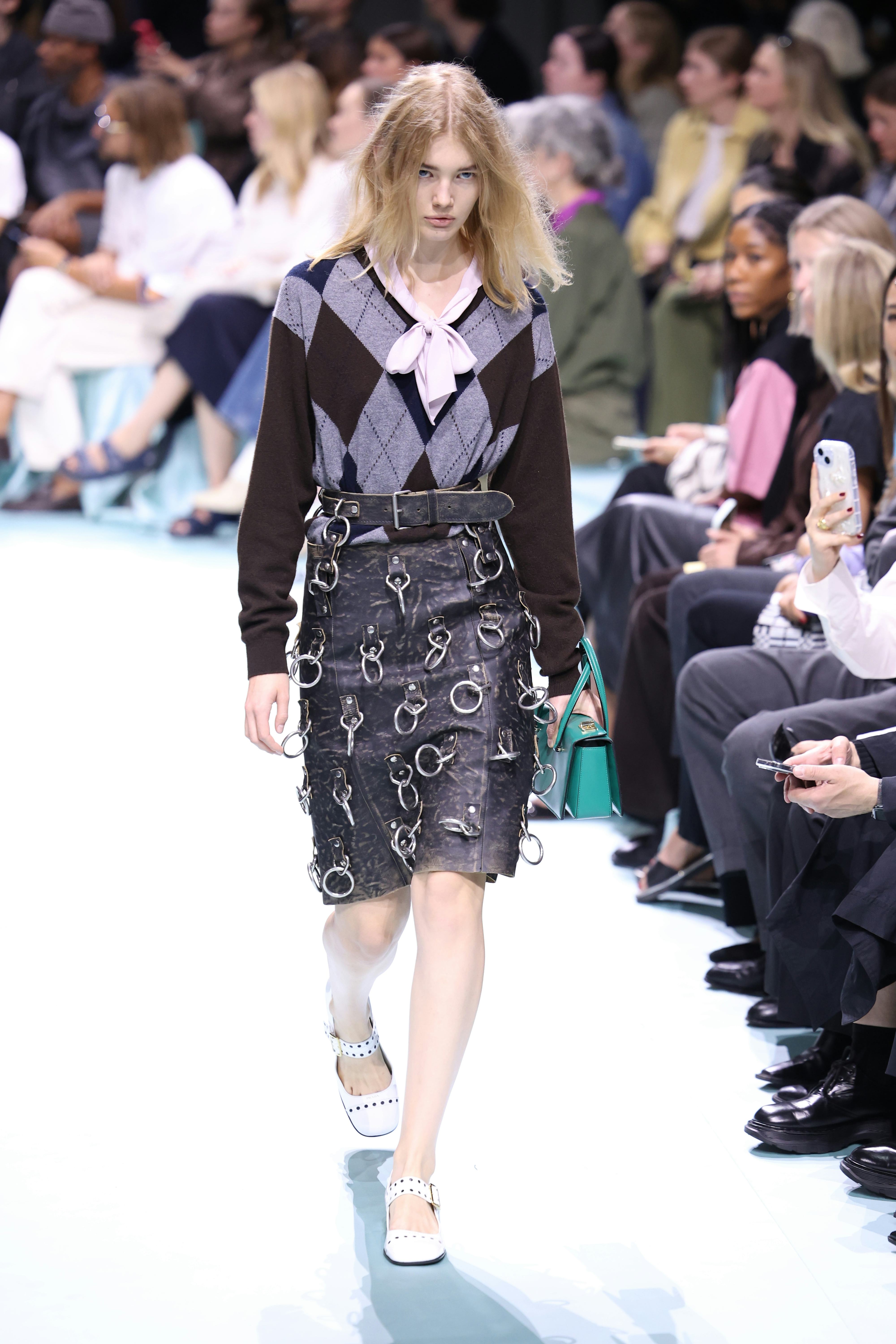 A model walks the runway at the Prada fashion show during the Milan Womenswear Spring/Summer 2025 on...