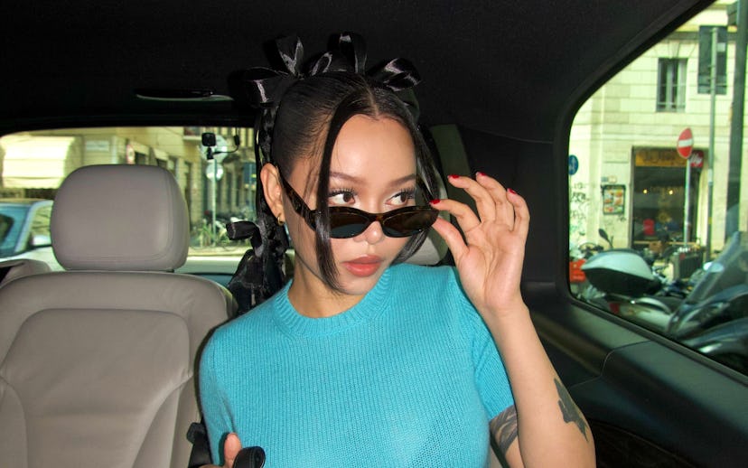 Singer Bella Poarch on her way to the Prada SS25 womenswear show in Milan during Milan Fashion Week.