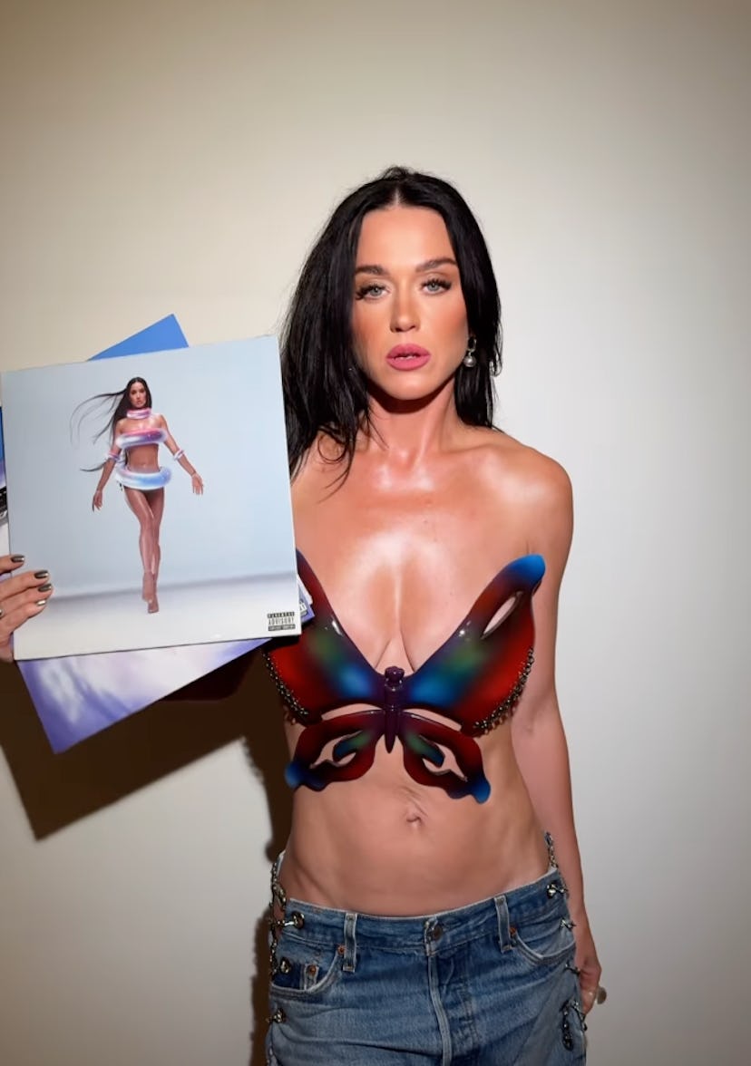 Katy Perry wore a butterfly bra top to promote her new album ‘143.'