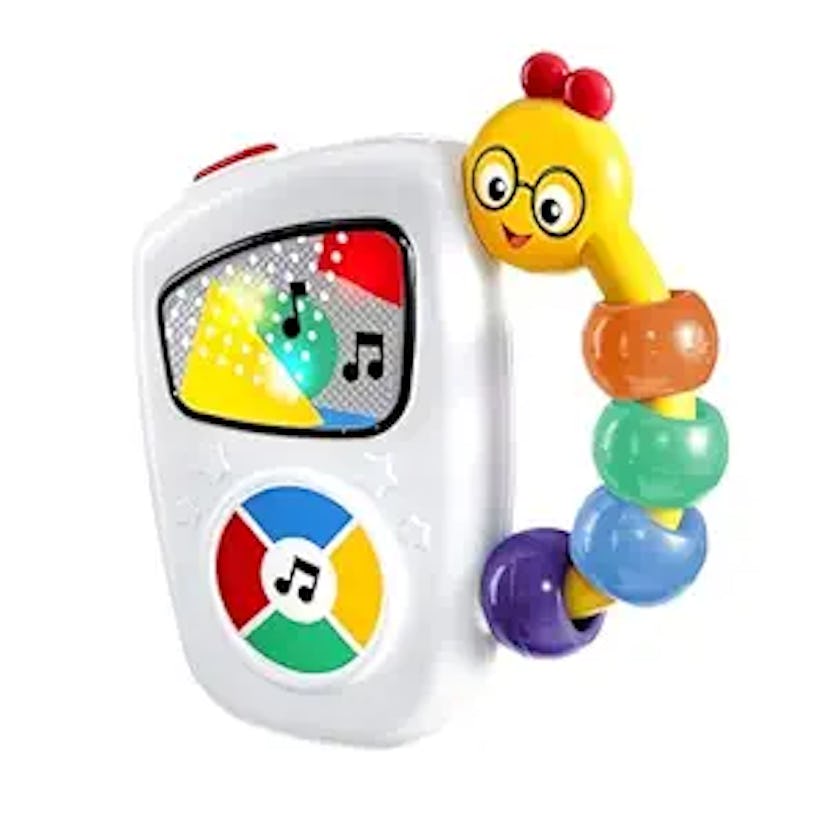 A colorful toy remote featuring a smiling caterpillar, musical notes, and bright buttons in a playfu...