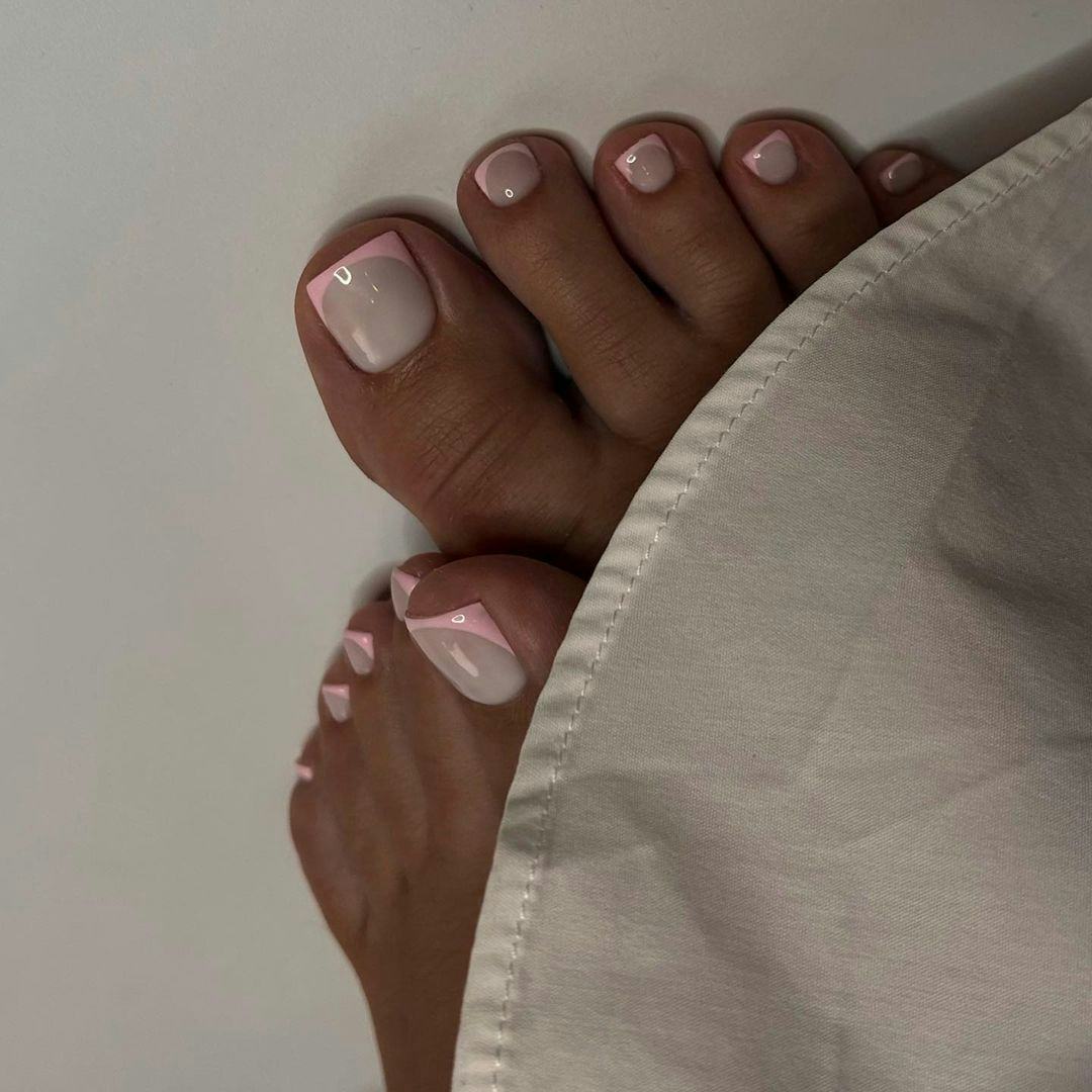 Baby pink French tips are the perfect pedicure for Libra season 2024.