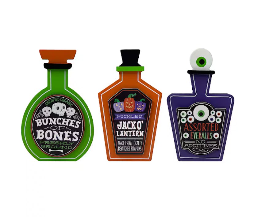 Assorted 7" Poison Bottle Tabletop Décor, a great option for cheap reusable halloween decorations