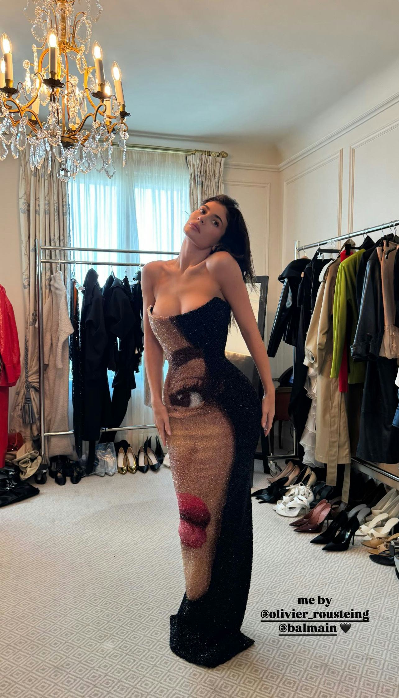 Kylie Jenner wears a Balmain dress with her face.