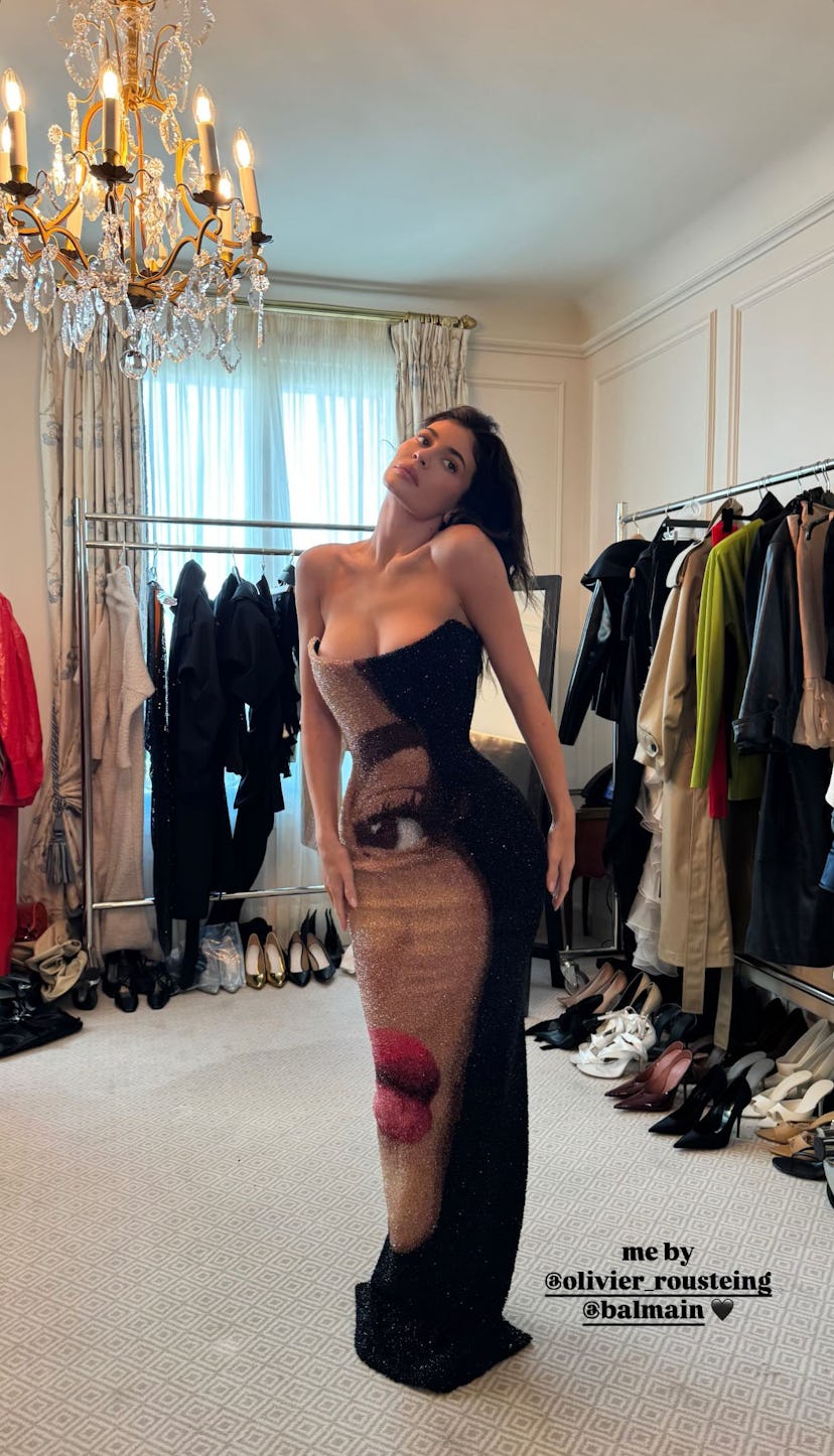 Kylie Jenner wears a Balmain dress with her face.