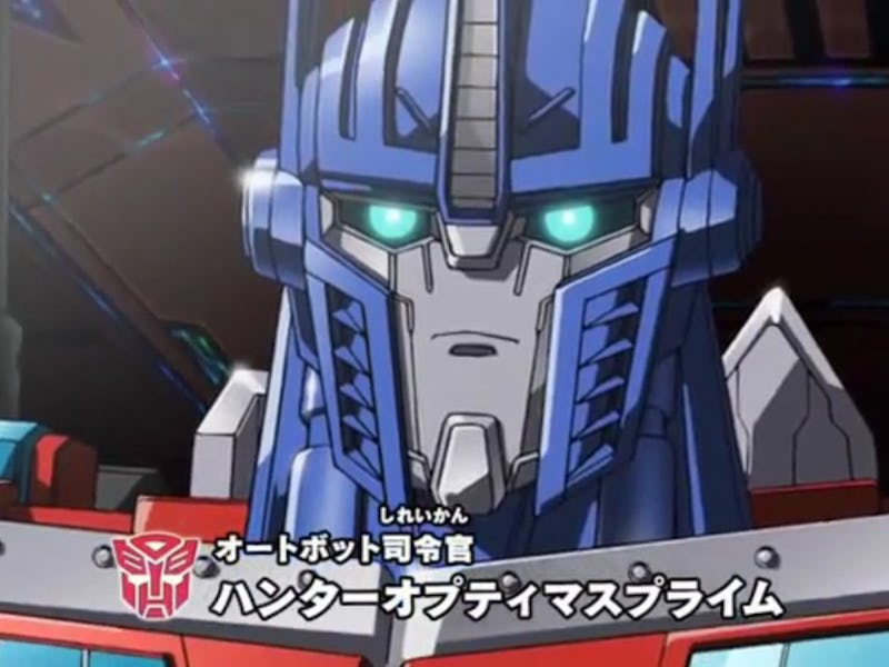 A close-up of a robotic character with blue and silver armor, featuring bright blue eyes and a stern...