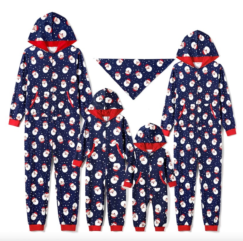 A festive set of matching Christmas-themed hooded onesies for family, featuring snowmen on a navy ba...