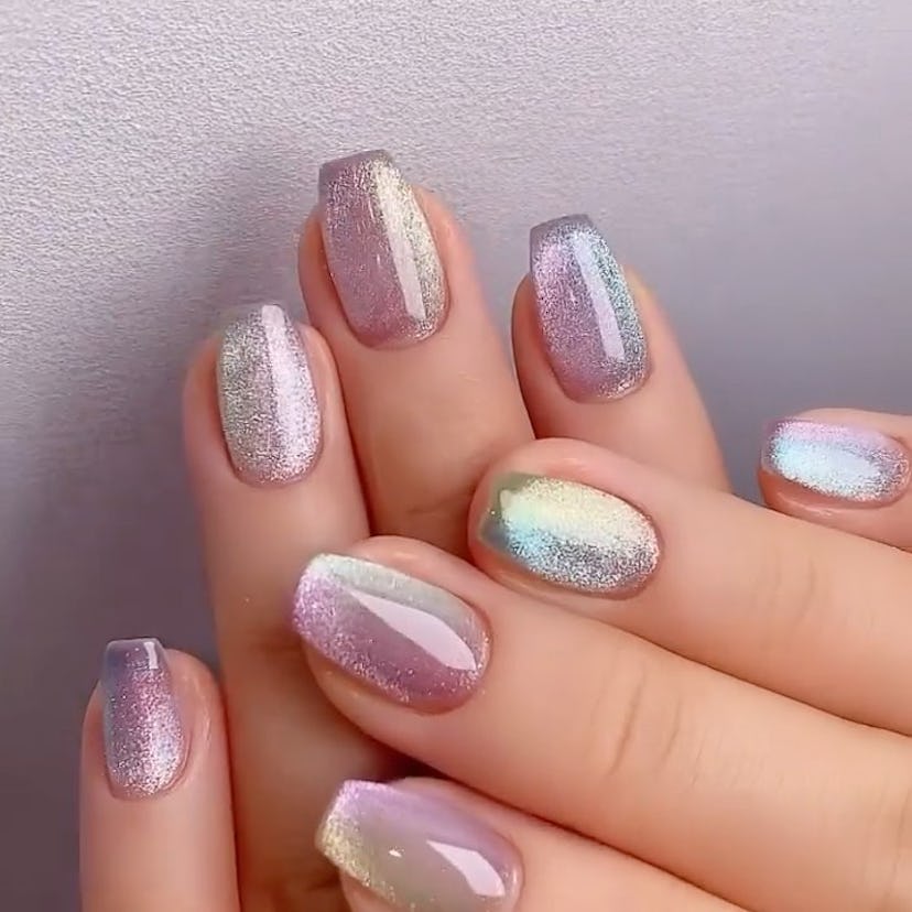 Pisces signs would wear cat-eye nails in pastel watercolor polish shades.
