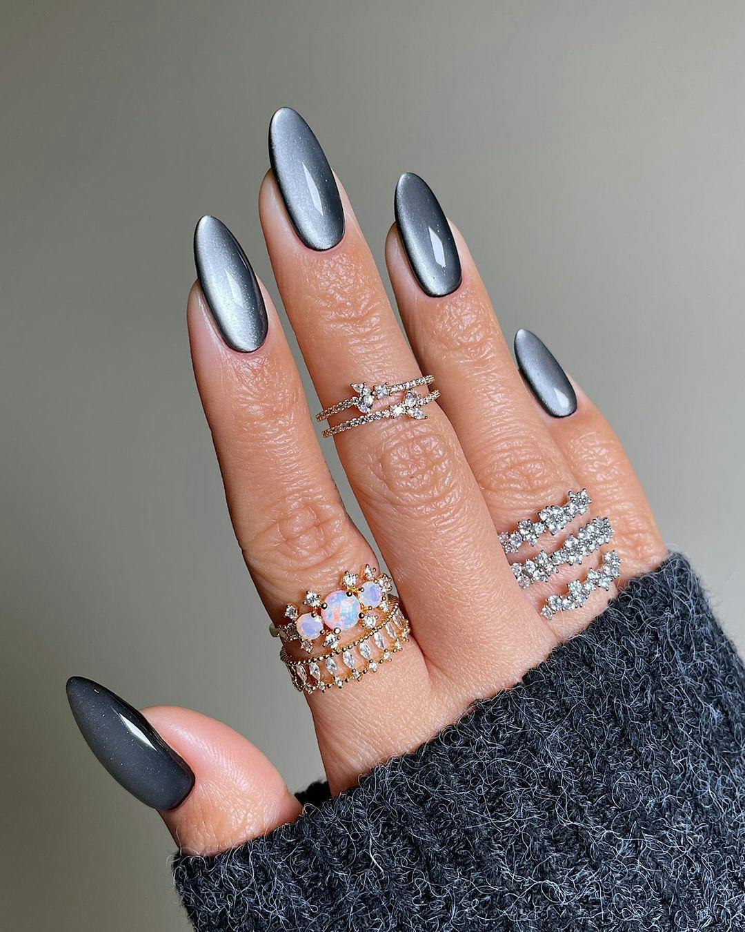 Cancer signs would wear gunmetal silver cat-eye nails.