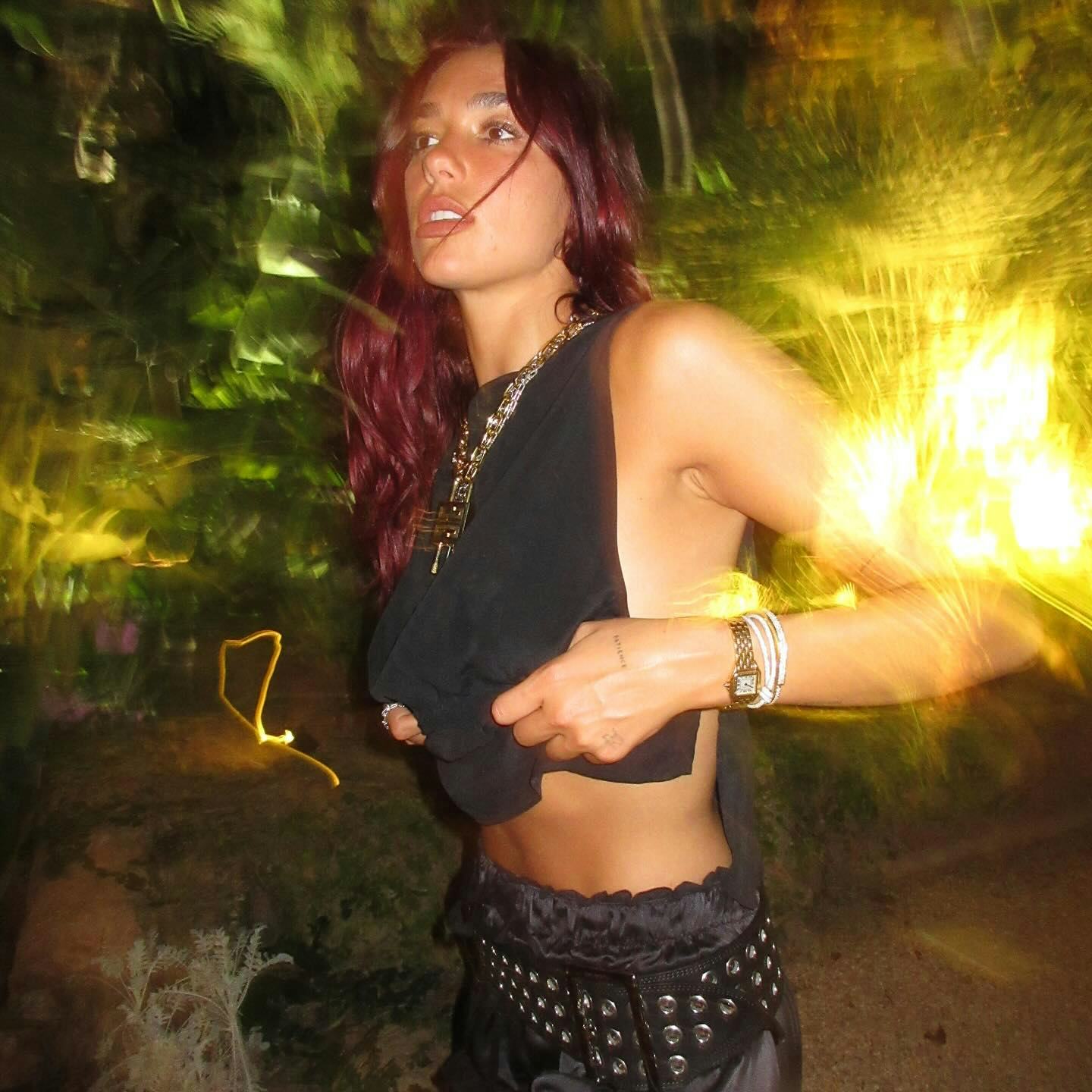 Dua Lipa brought back the Y2K grommet belt.