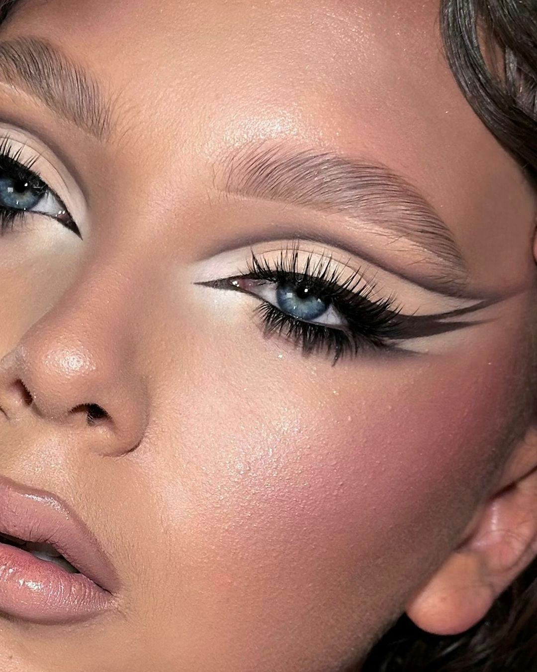 Try graphic eye looks with cool-toned lips for fall 2024.