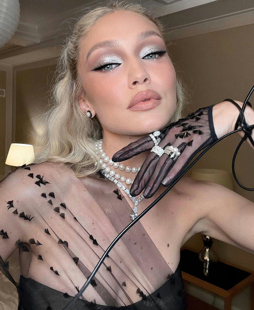 Try a cut crease with sparkling silver eyeshadow for fall 2024.