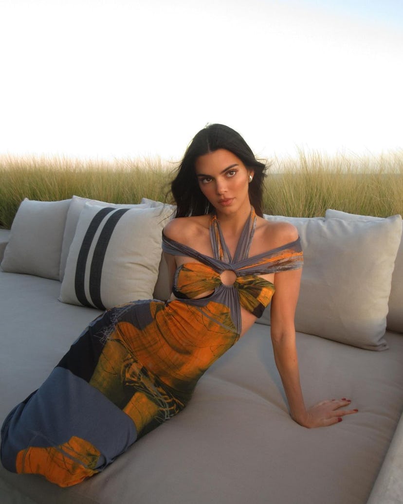 Kendall Jenner wears a Jean Paul Gaultier dress.