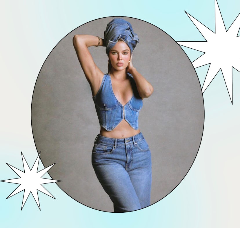 Khloe Kardashian wearing a Good American denim jacket as a towel