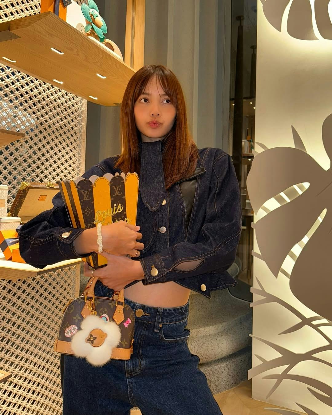 Lisa Brings the Bag Charm Trend Into 2025 With a Cropped