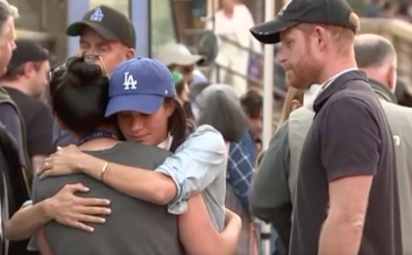 Meghan and Harry visit Los Angeles fire survivors and emergency workers. Screenshot via BBC