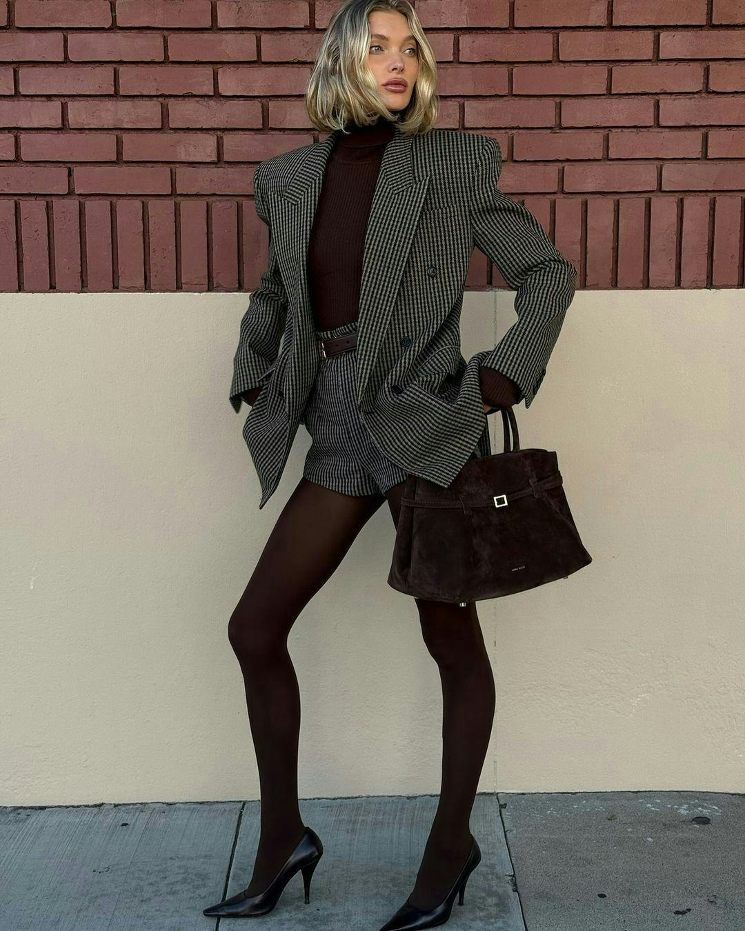 Elsa Hosk wears a blazer with matching shorts.