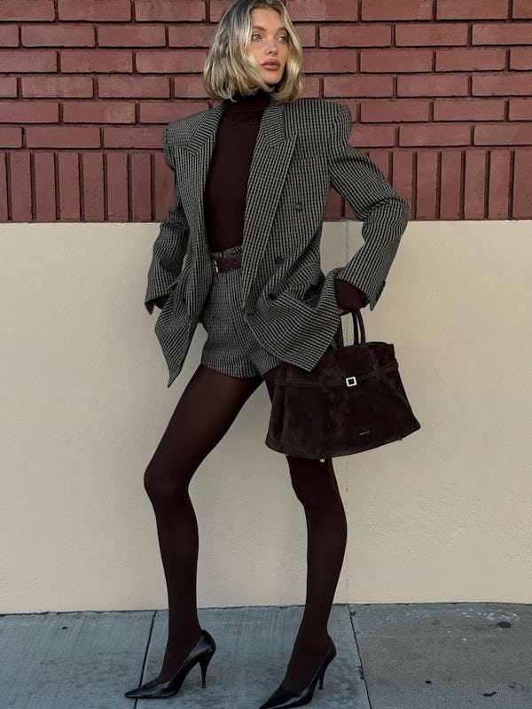 Elsa Hosk wears a blazer with matching shorts.
