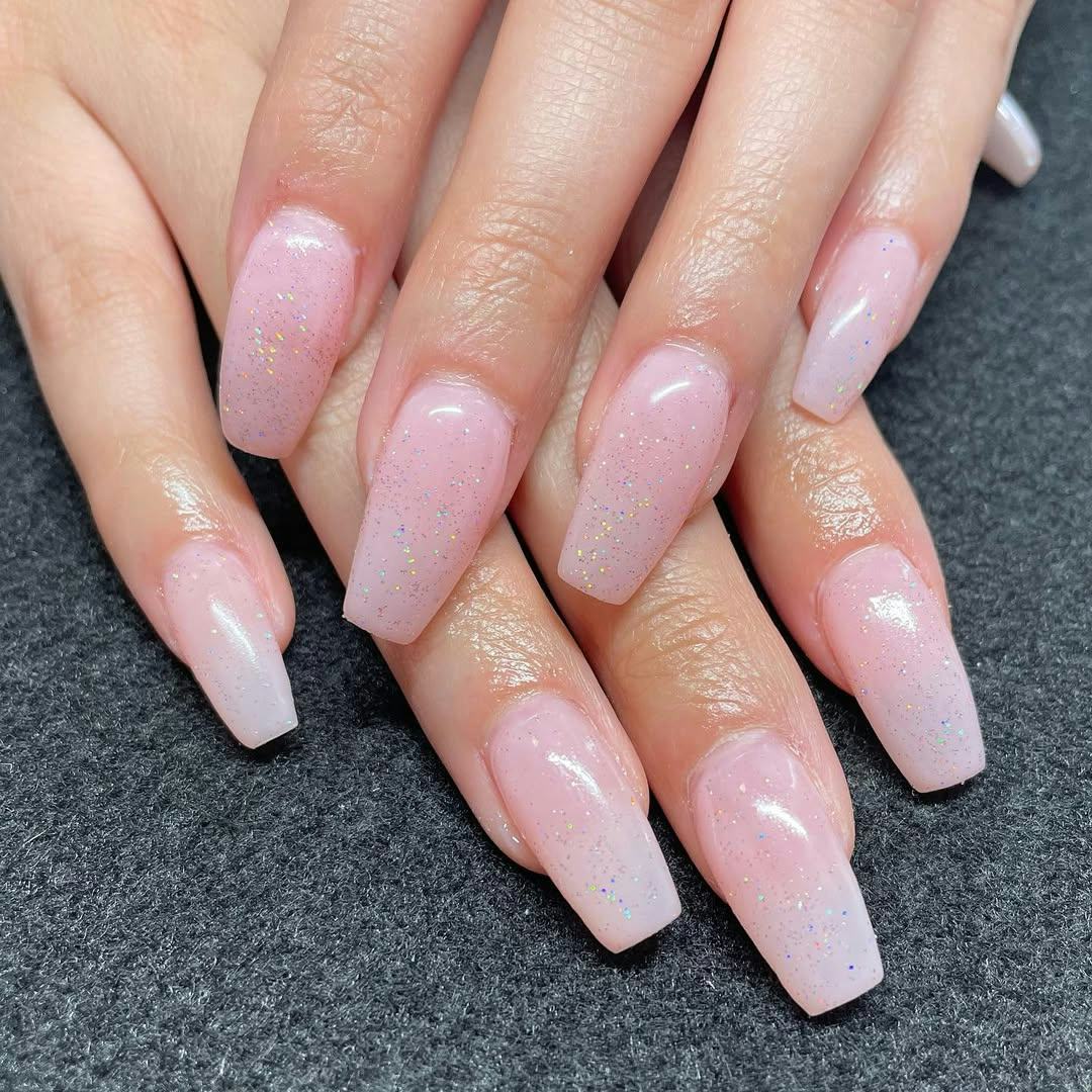 &ldquo;Strawberry milk&rdquo; nail art designs are on-trend for 2025.