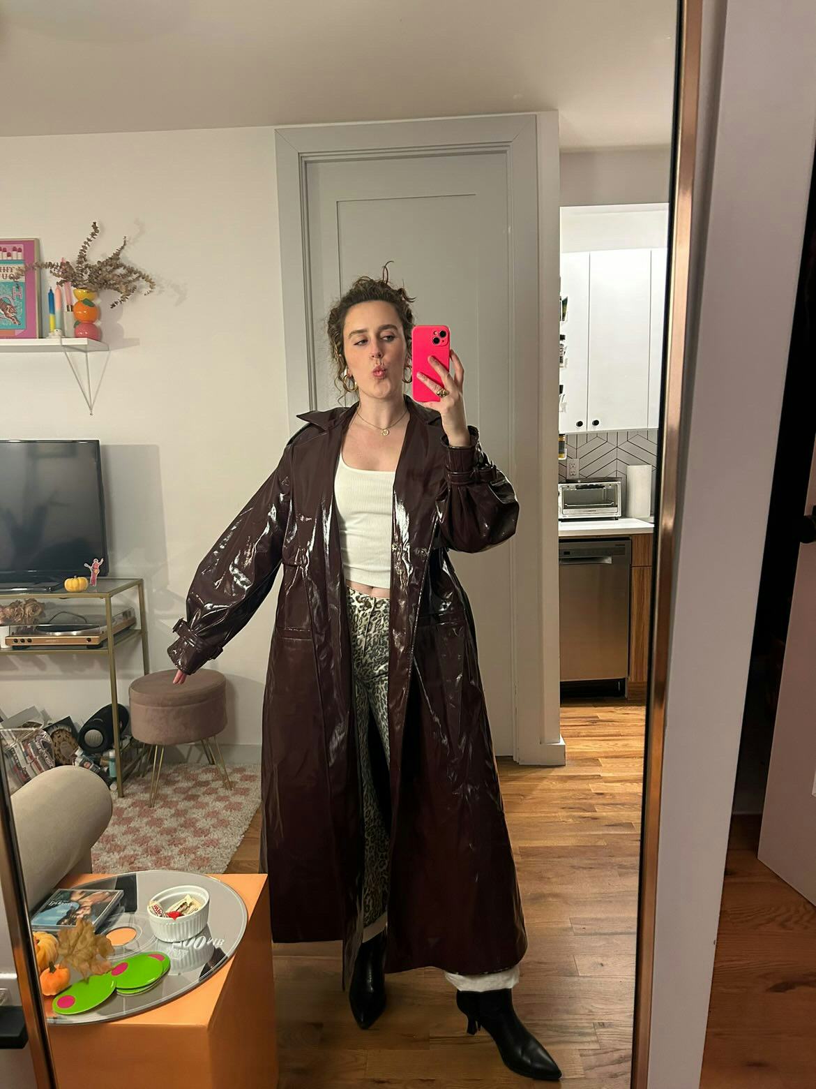 Elaine, posing in her Nuuly coat.