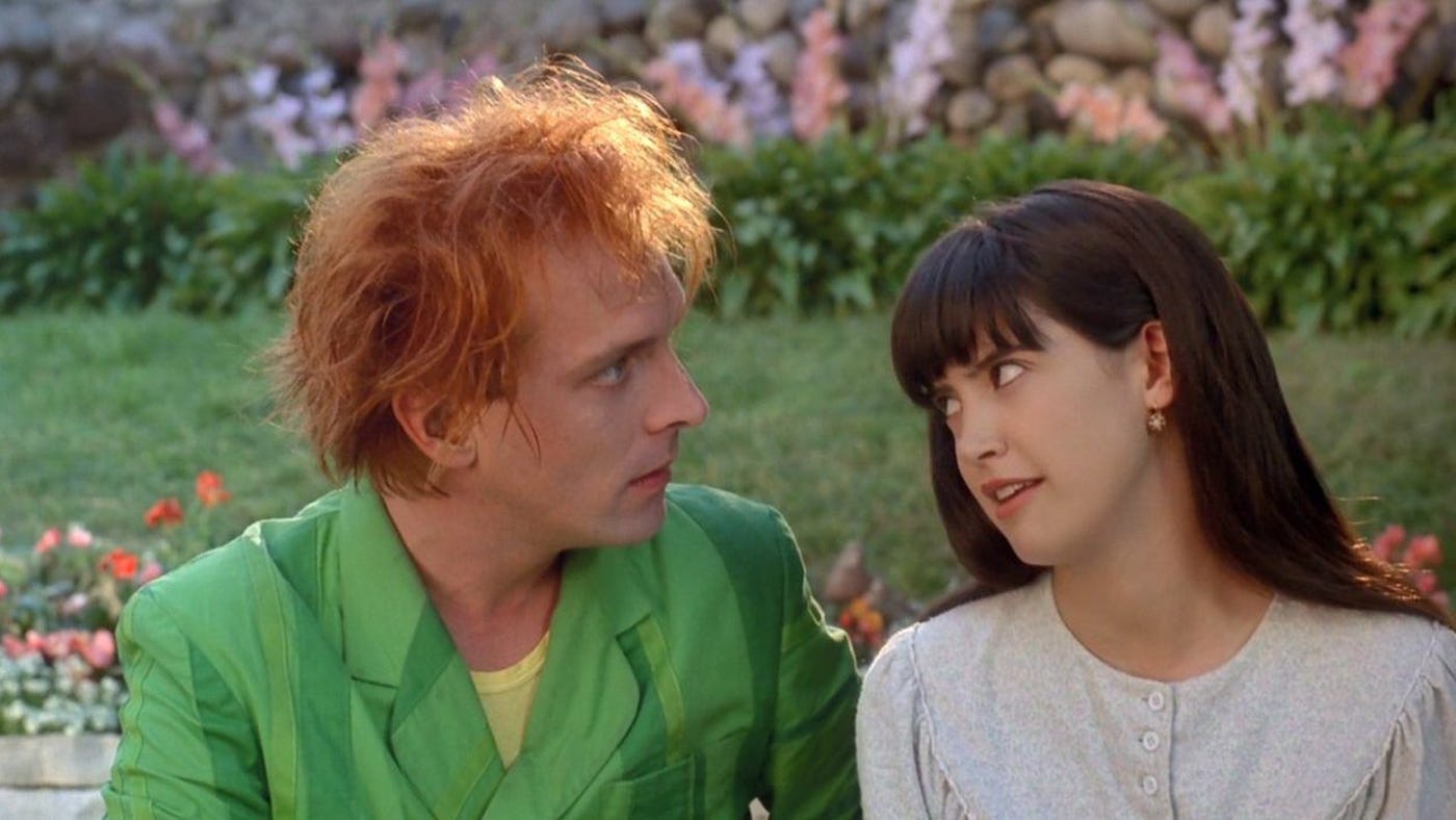In the classic '90s dark comedy, 'Drop Dead Fred, Phoebe Cates stars as a young woman named Elizabeth Cronin and Rik Mayall as her imaginary friend, Drop Dead Fred.