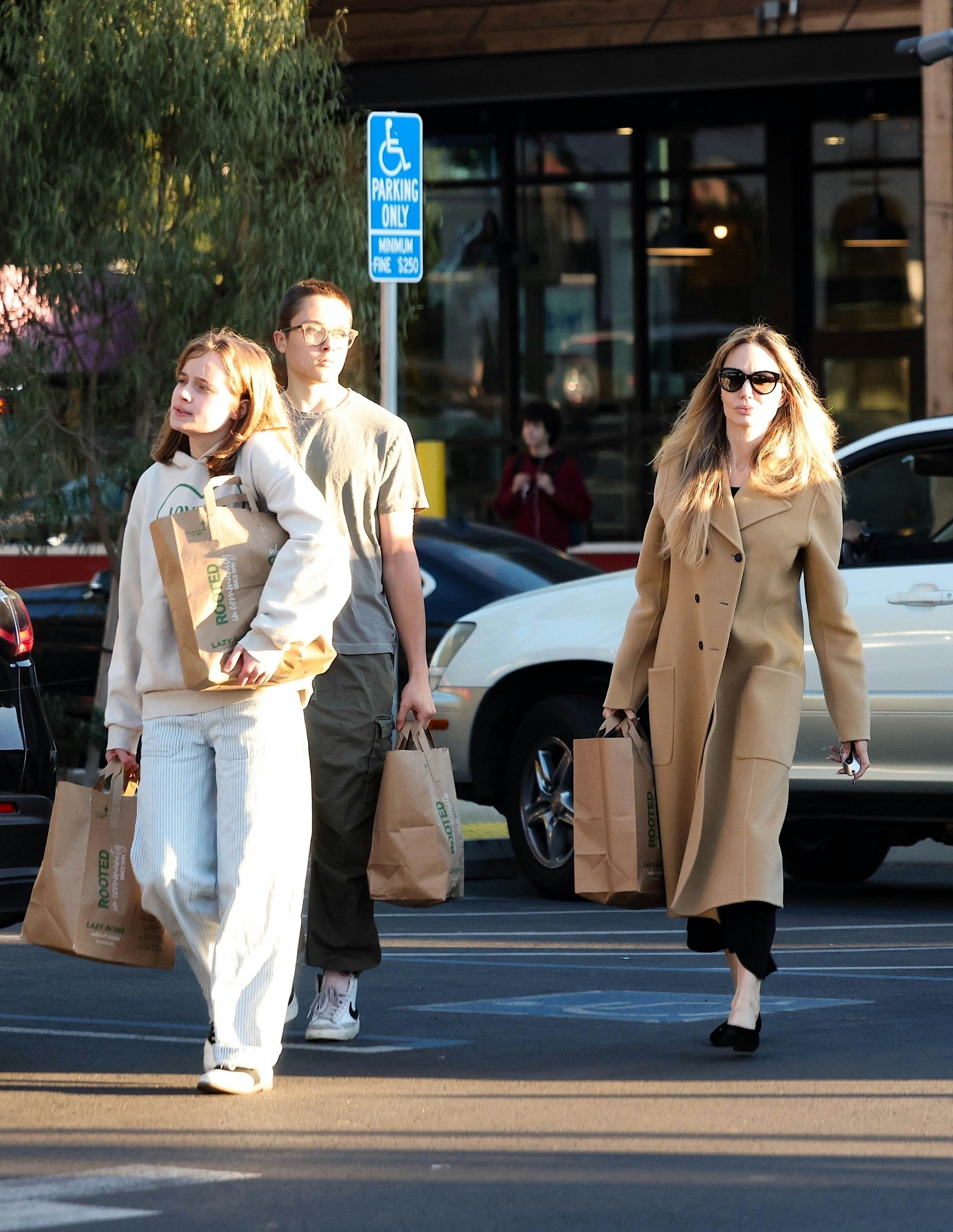 Angelina Jolie Is Peak Rich Mom While Out With Kids Vivienne and Knox