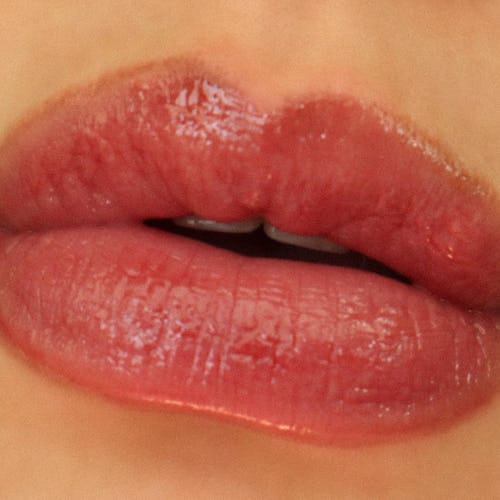 Here’s an honest review of Hourglass' newest Phantom Volumizing Glossy Lip Balm in the shade Red 0.