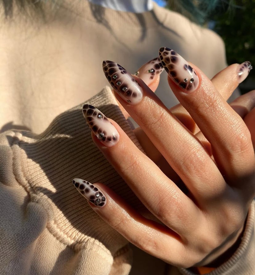 Celebrate the 2025 Lunar New Year with a snake-inspired manicure.