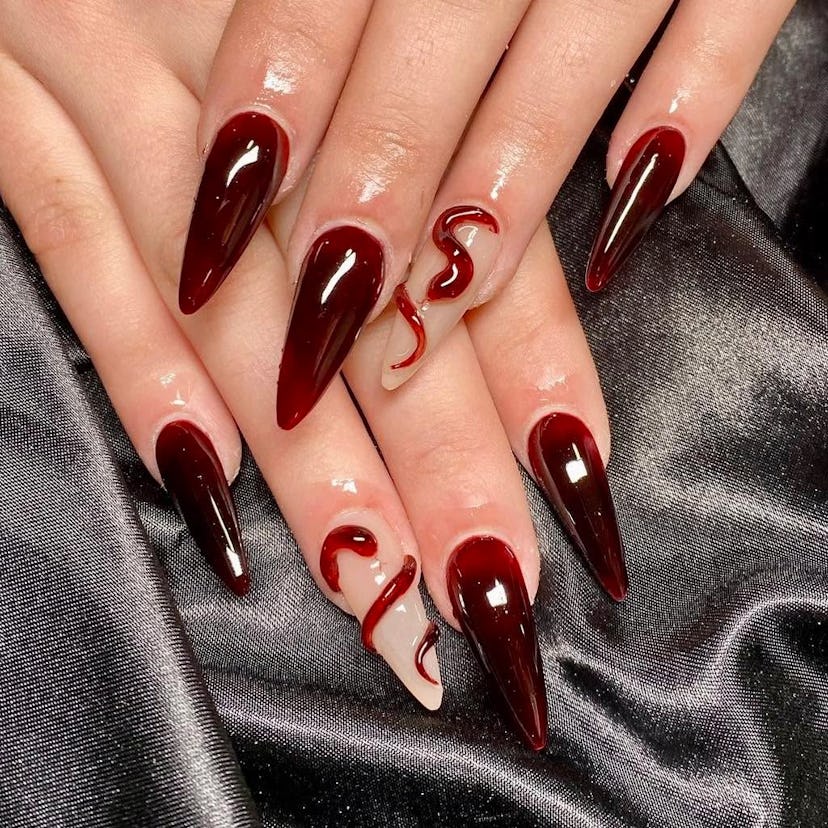 Celebrate the 2025 Lunar New Year with a snake-inspired manicure.