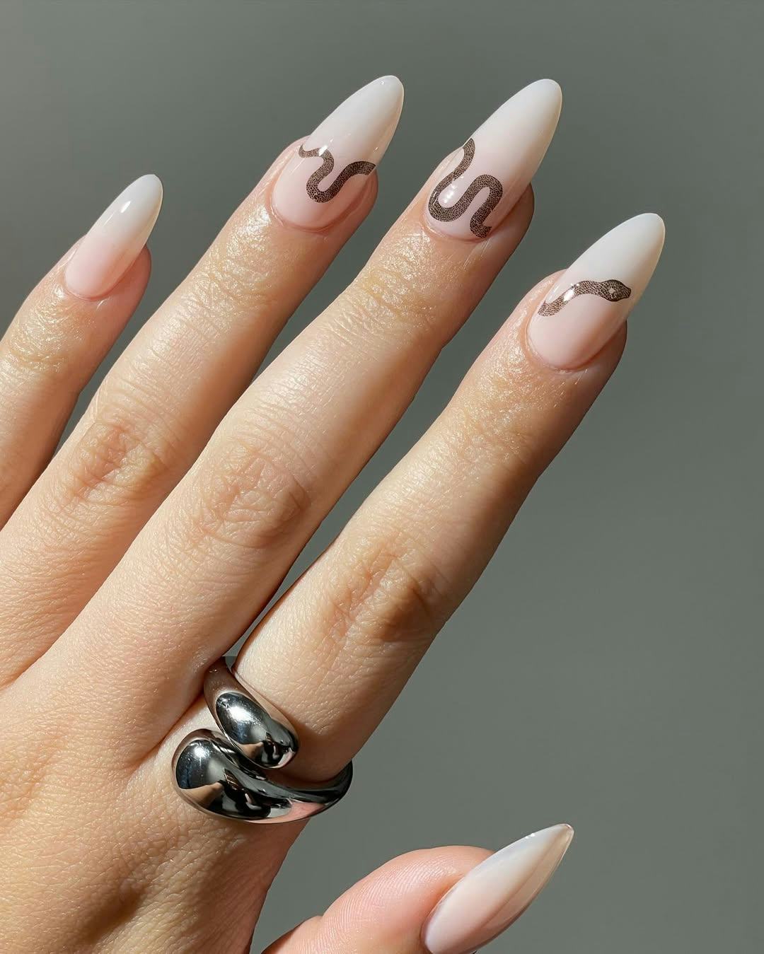 Celebrate the 2025 Lunar New Year with these snake-inspired nail art designs.