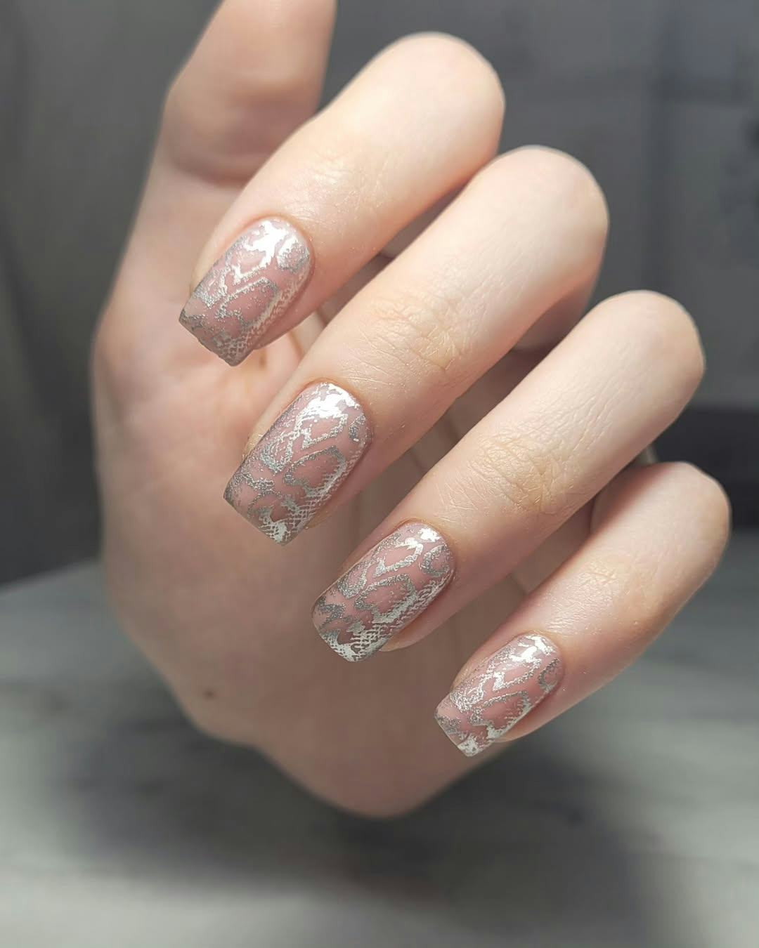 Celebrate the 2025 Lunar New Year with a snake-inspired manicure.