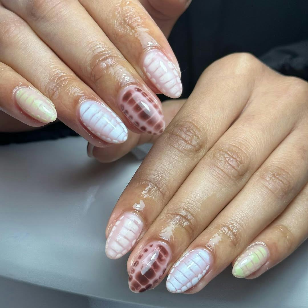 Celebrate the 2025 Lunar New Year with a snake-inspired manicure.