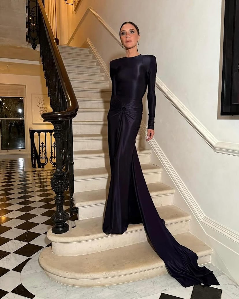 Victoria Beckham wears a maxi dress.