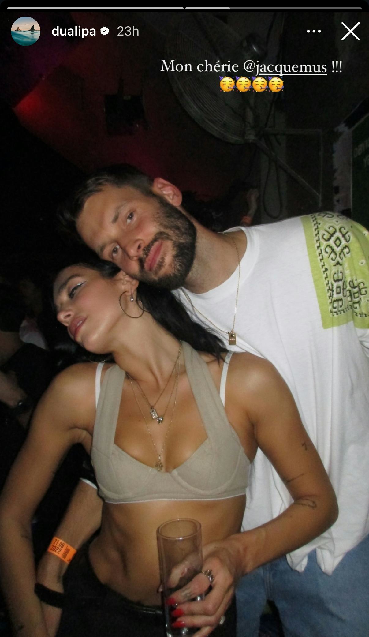 Dua Lipa wearing a bra as a top