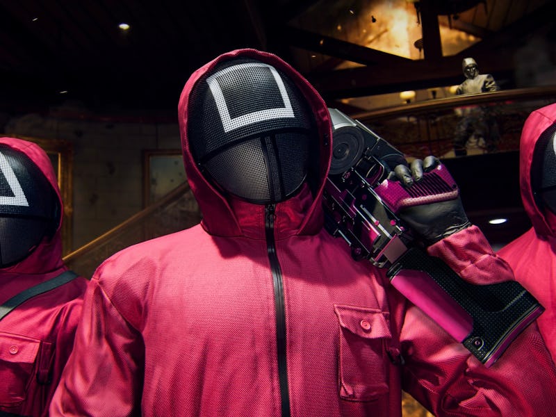 The pink jumpsuit-wearing guards of Squid Game