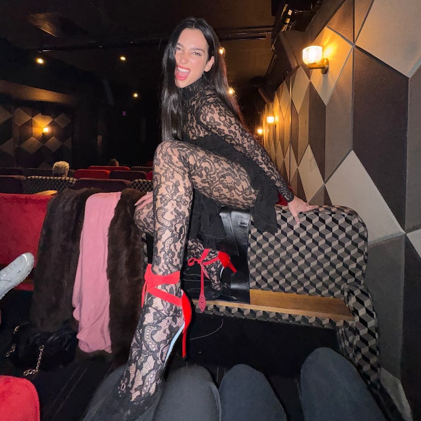 Dua Lipa wore a lacy catsuit.