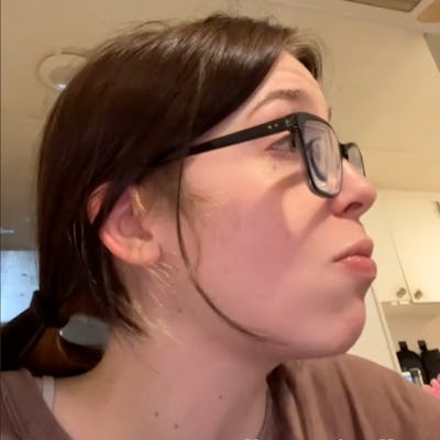 A woman with glasses is looking to the side, with a thoughtful expression. Text above her reads, "take this as your sign that you ARE a good parent."