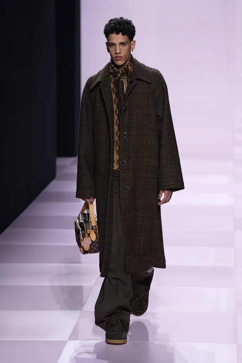A model walks the runway during the Louis Vuitton Menswear Fall-Winter 2025/2026 show as part of Par...