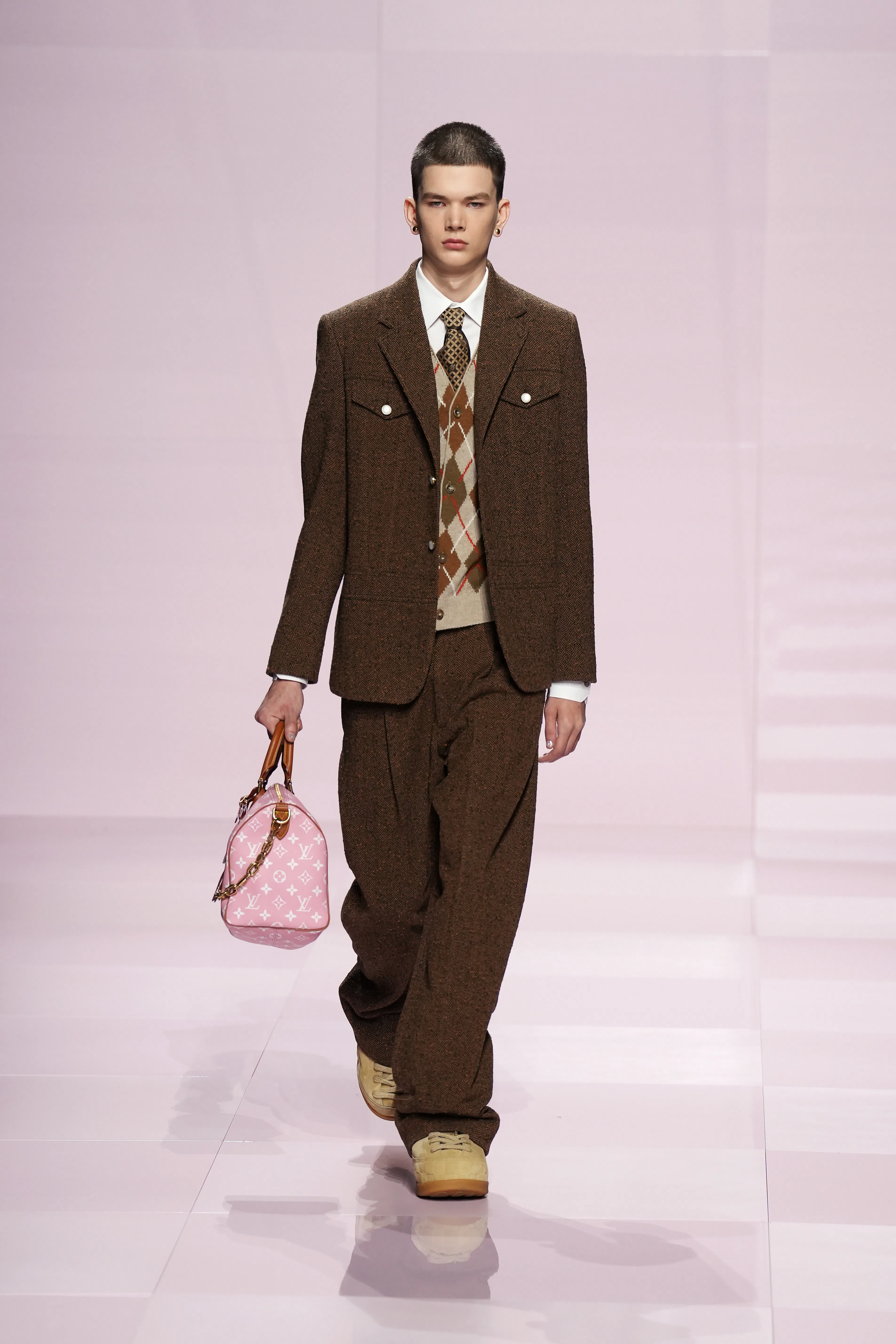A model walks the runway during the Louis Vuitton Menswear Fall-Winter 2025/2026 show as part of Par...