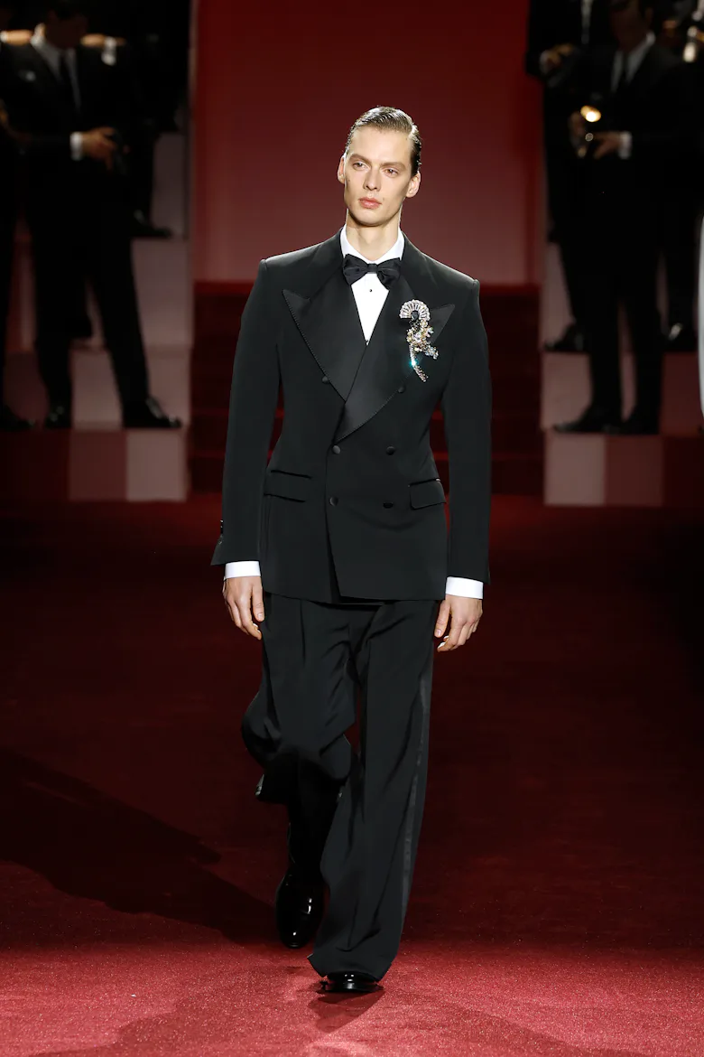 A model walks the runway at the Dolce & Gabbana fashion show during the Milan Menswear Fall/Winter 2...