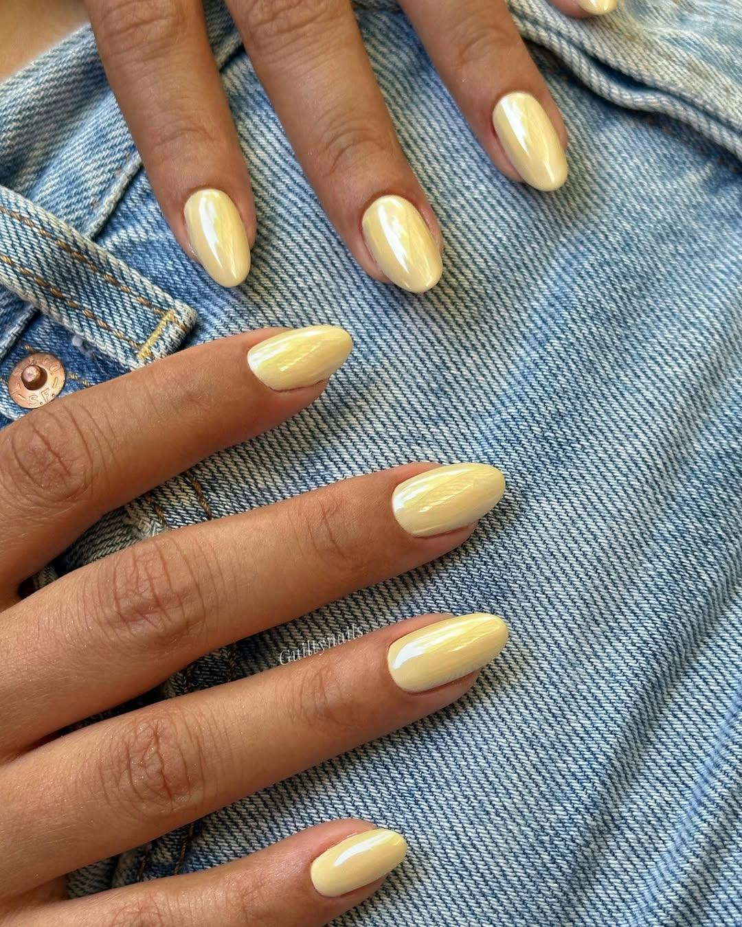 Butter yellow is a trending polish color for 2025.