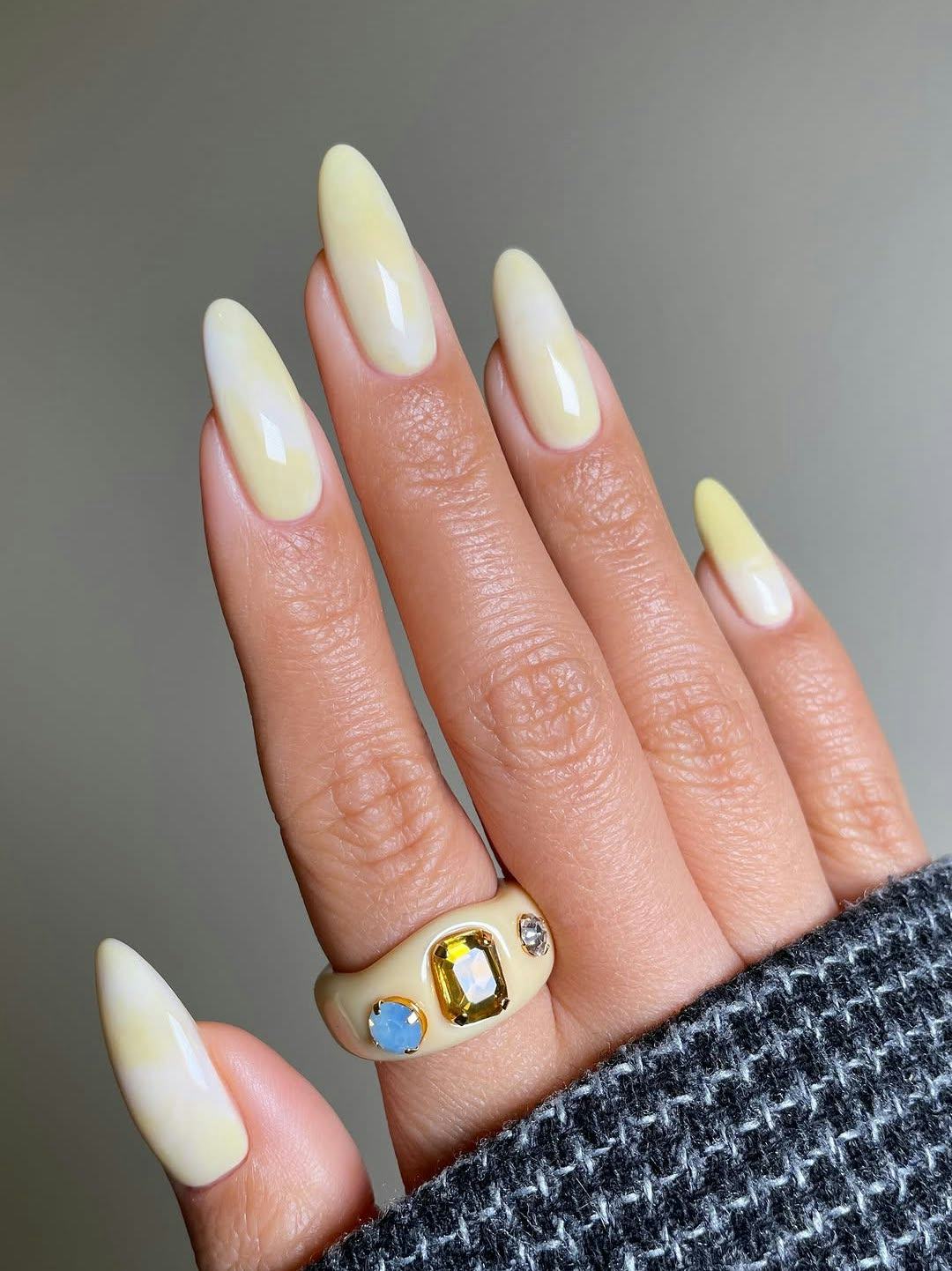 Tap the trending "butter yellow" color with these pastel nail art designs.