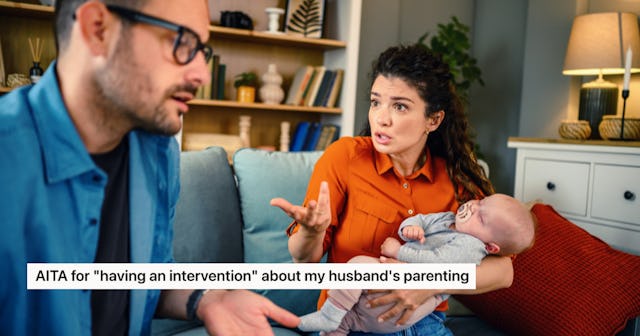 A concerned woman holding a baby gestures towards a man, who appears perplexed, in a cozy living roo...