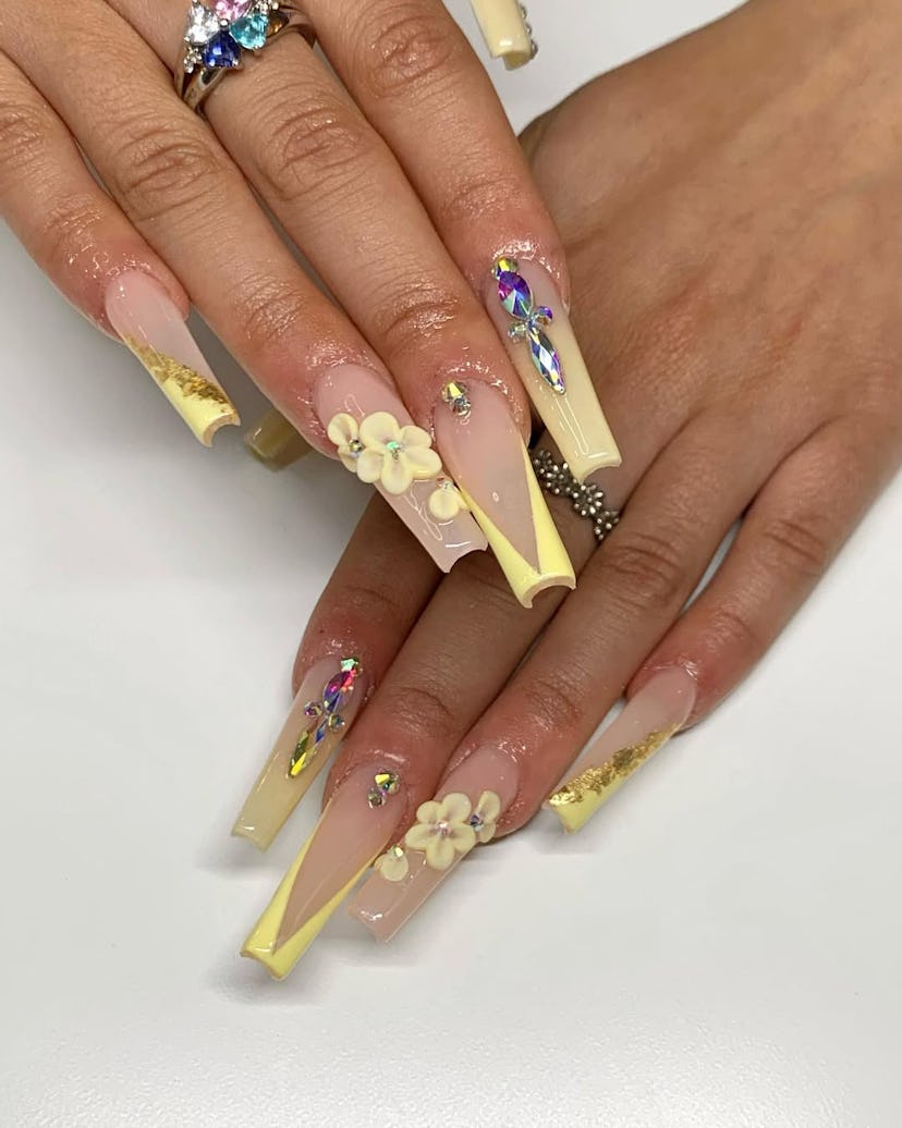 Butter yellow is a trending polish color for 2025.