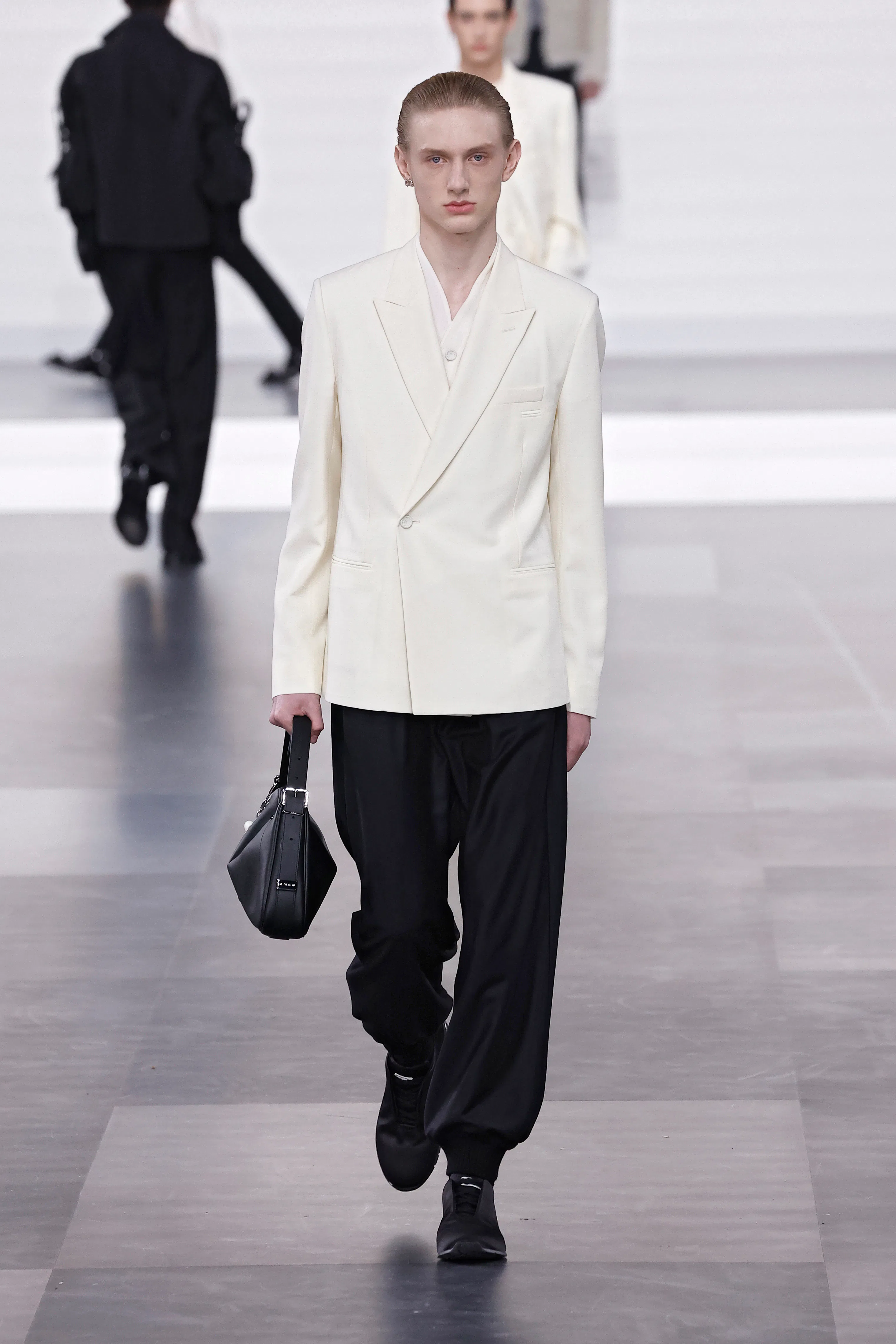 A model walks the runway during the Dior Homme Menswear Fall-Winter 2025/2026 show as part of Paris ...