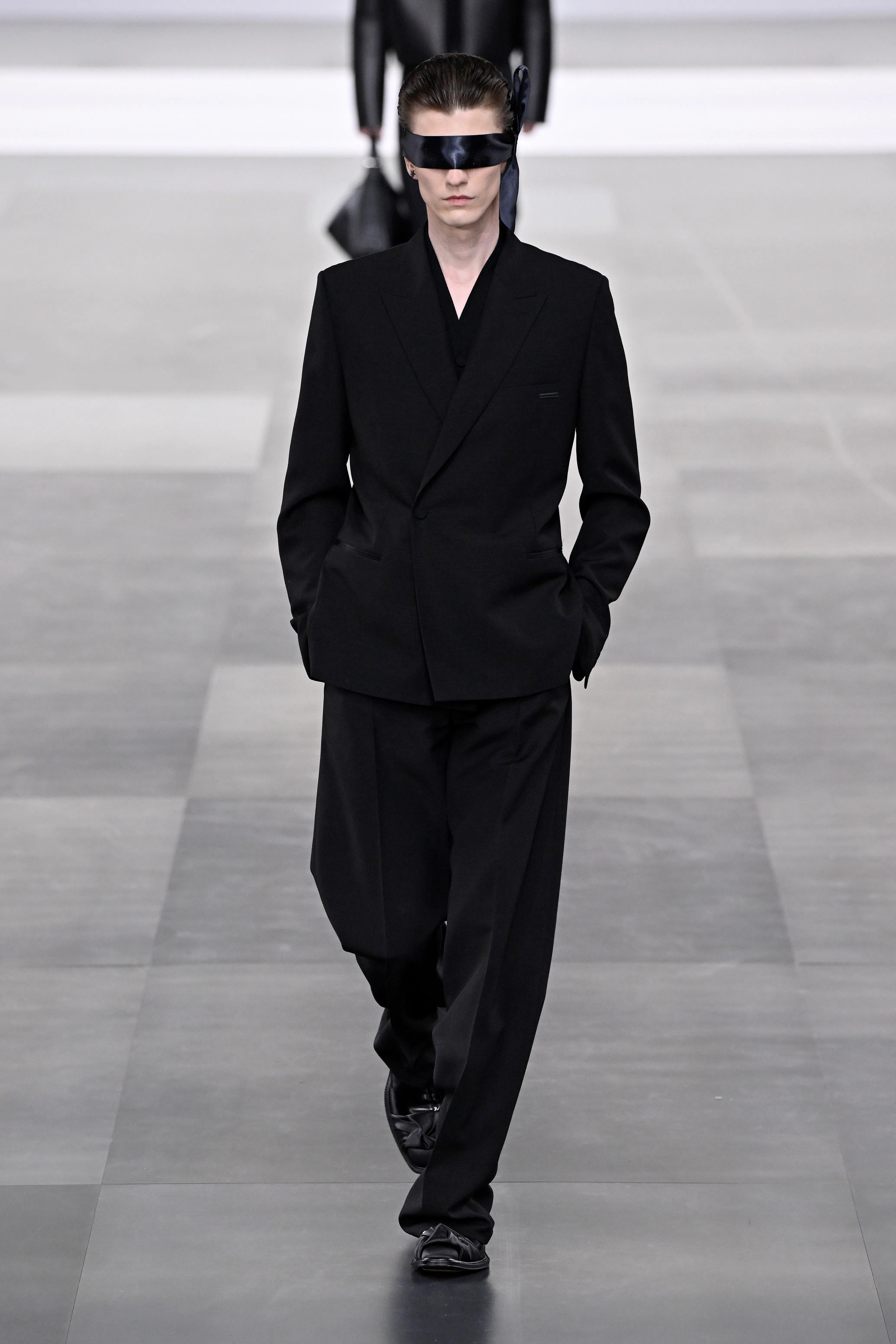 A model walks the runway during the Dior Homme Menswear Fall-Winter 2025/2026 show as part of Paris ...