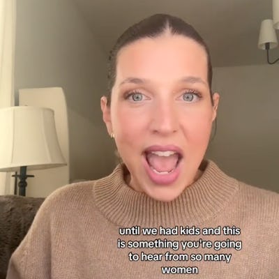 A woman in a tan sweater speaks animatedly, with text overlay discussing common experiences shared by women after having children. Soft lighting surrounds her.