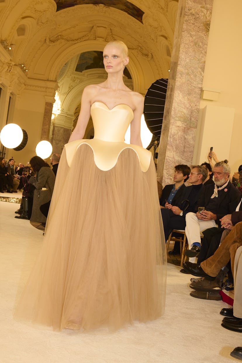a look from schiaparelli spring 2025 haute couture collection shown in paris