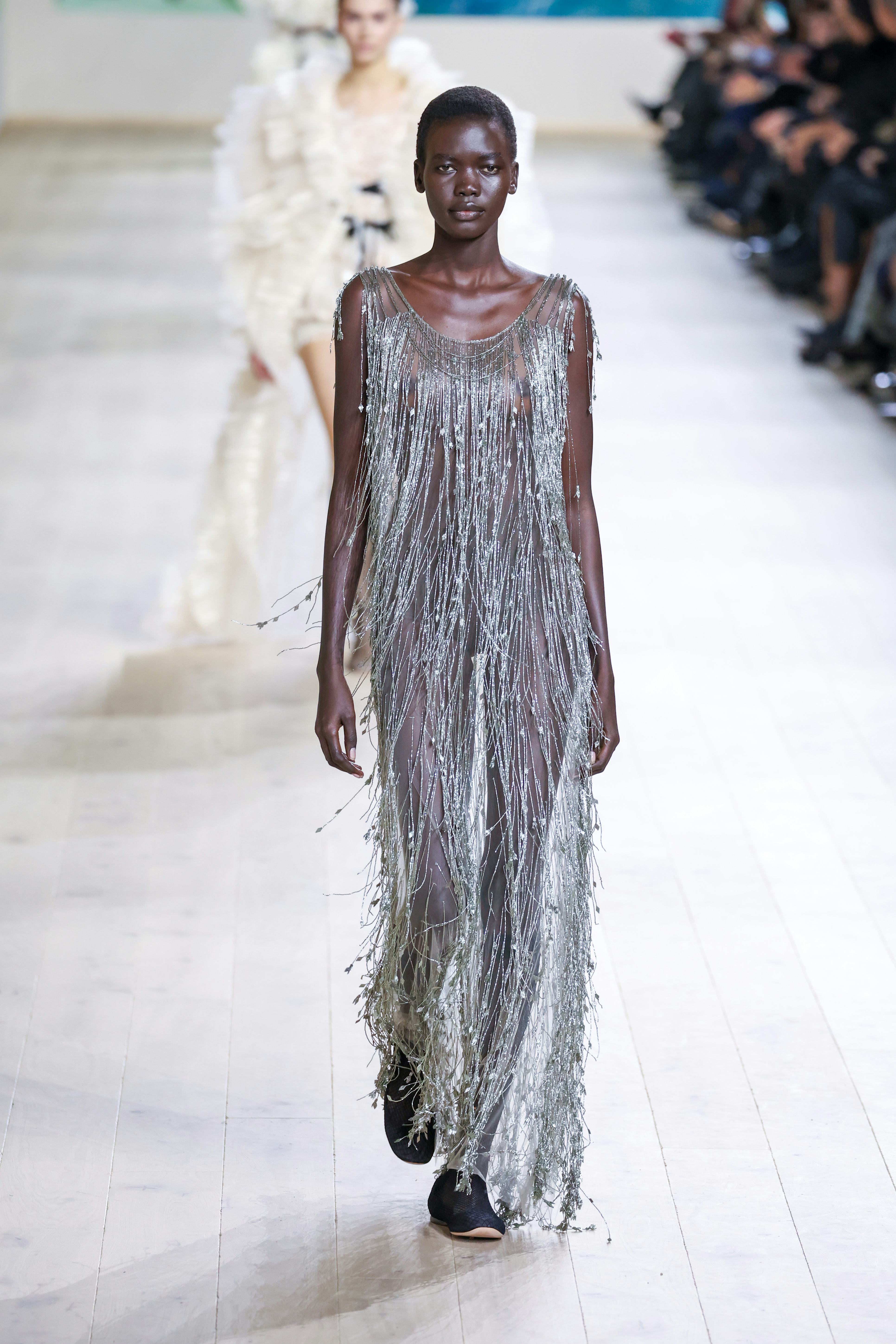A model walks the runway during the Christian Dior Haute Couture Spring-Summer 2025 show as part of ...